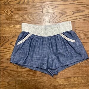 Just be cotton boho shorts with crochet accents. Size Medium
